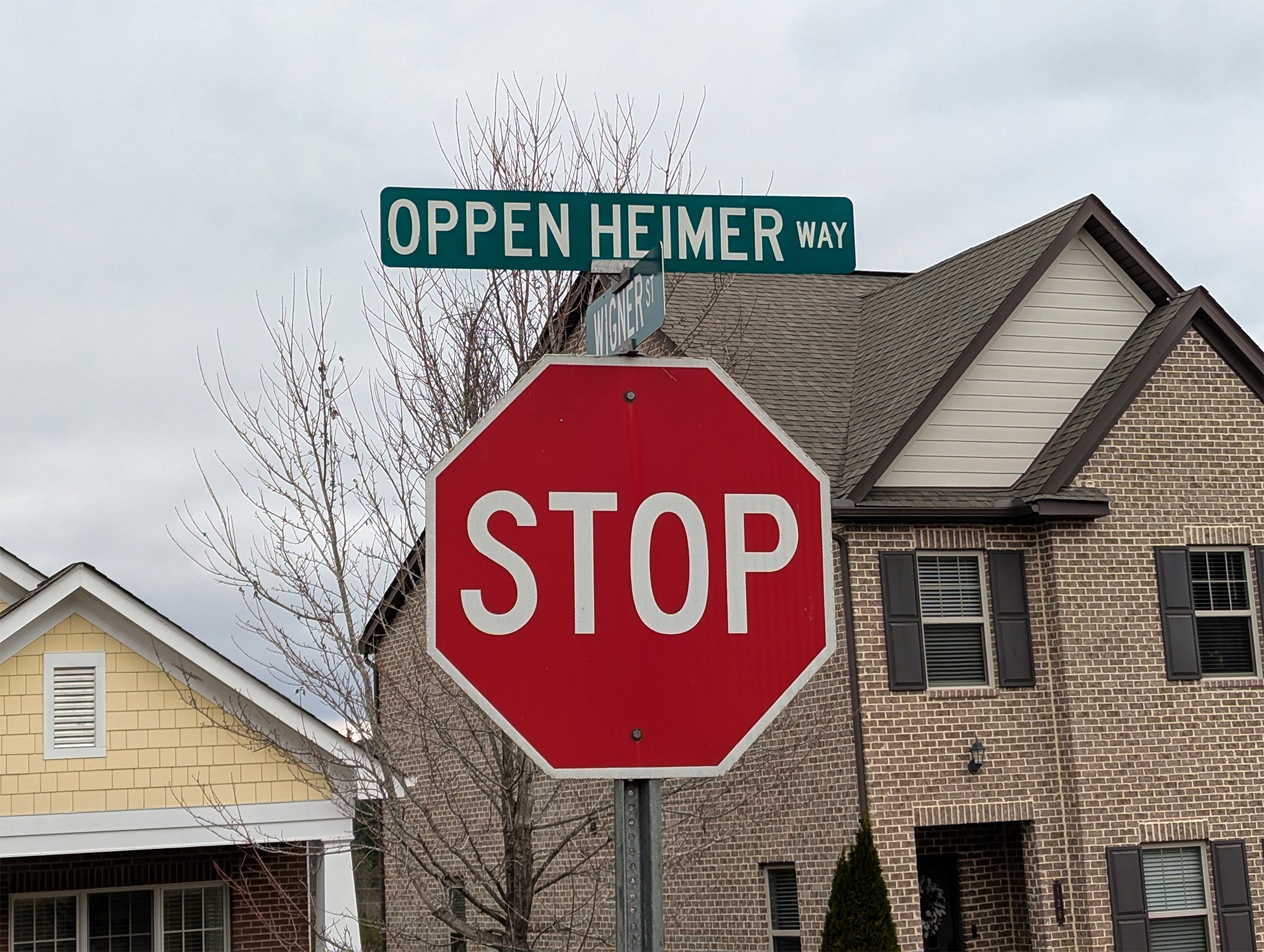 Nuclear-themed street names crisscross Oak Ridge, including Oppenheimer Way and Centrifuge Way.