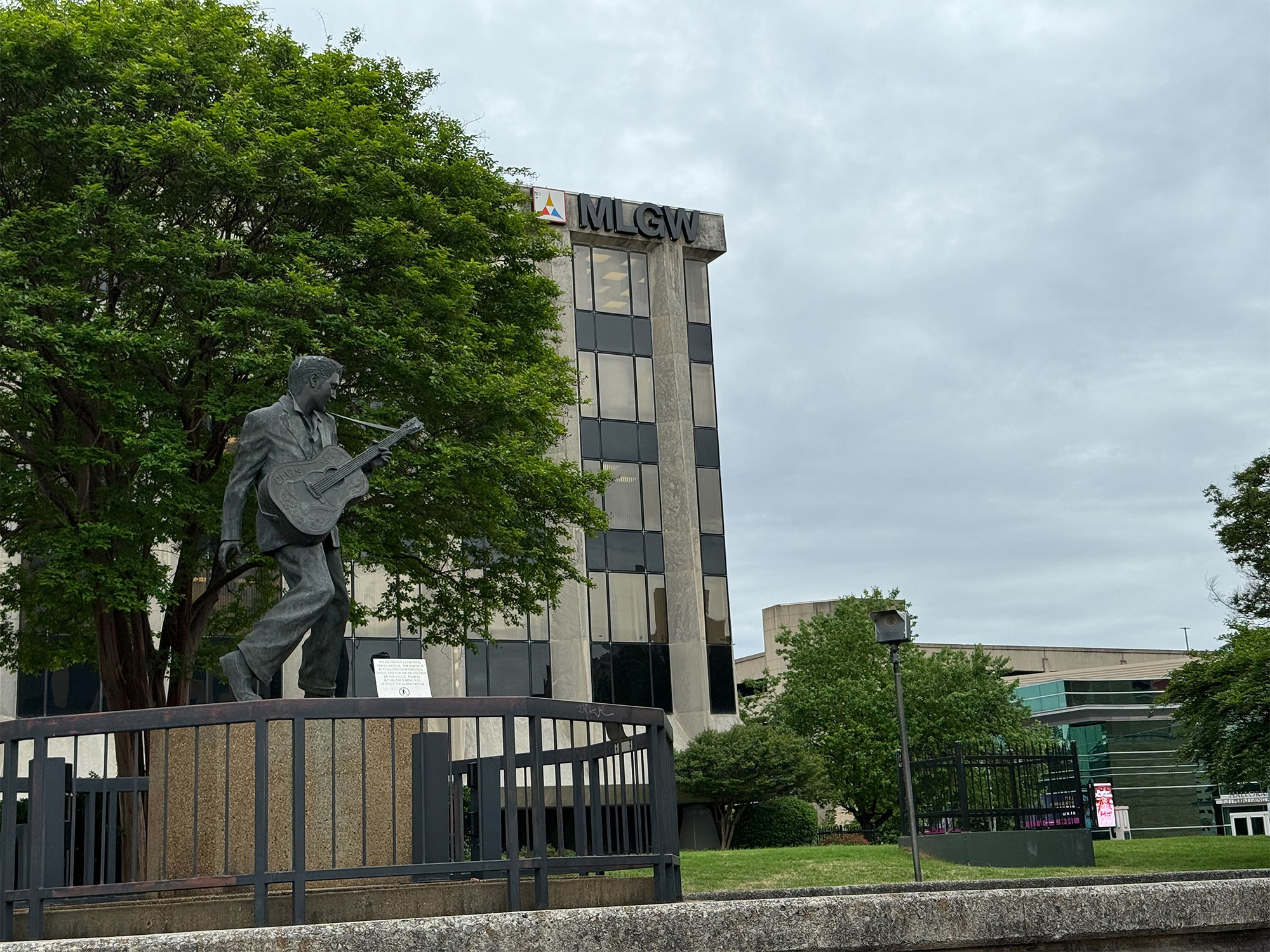 A statue of Elvis sits outside the headquarters of the local utility, Memphis Light Gas and Water. A statue of Elvis sits outside the headquarters of the local utility, Memphis Light Gas and Water.