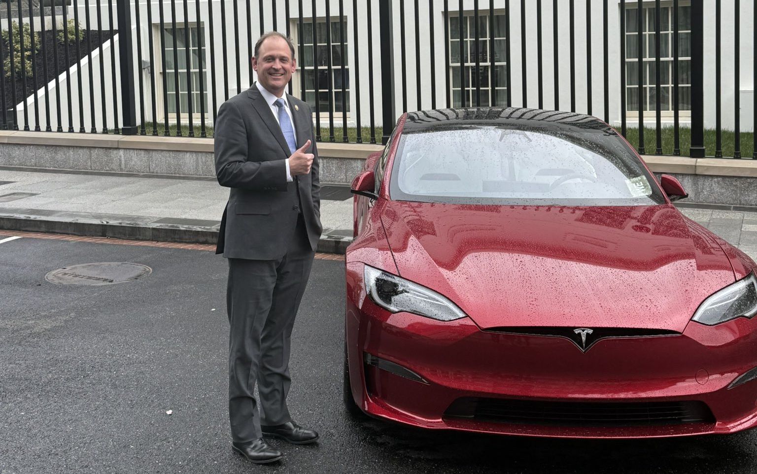 Rep. Andy Barr (R-Ky.) posing with a Tesla at the White House. 
